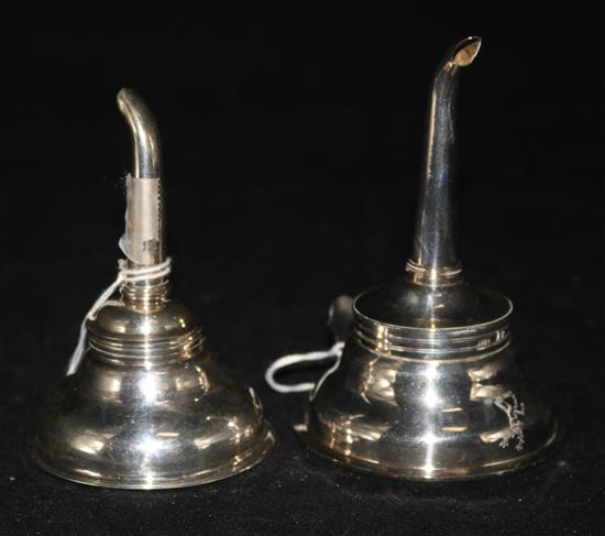 A George III silver wine funnel, crested, London 1794, maker Henry Chawner and a small Irish wine funnel.